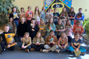 The Hilltop Elementary Kindness Crew is pictured with the items they collected of the local animal shelter.